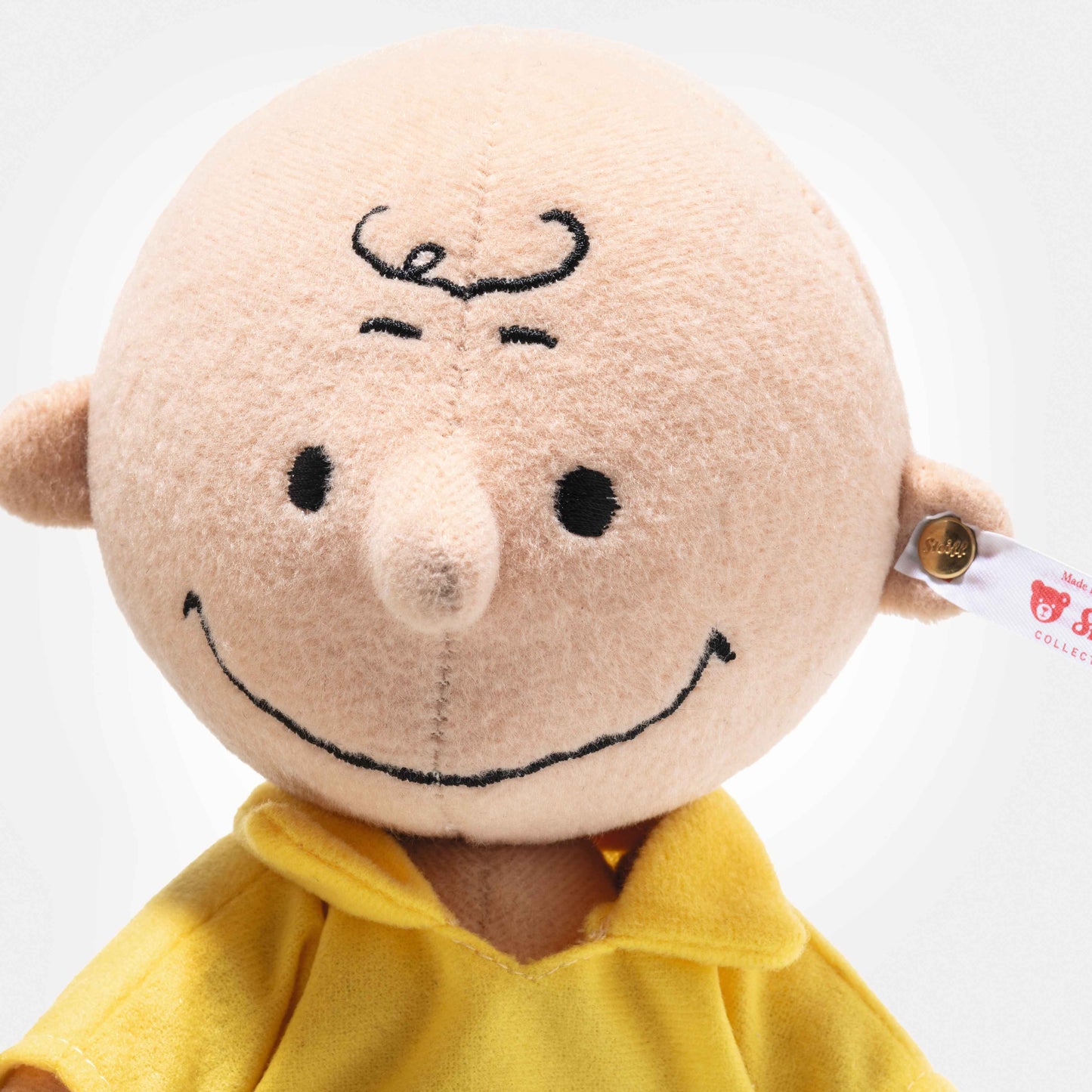 Steiff Charlie Brown mit Snoopy 75. Jubiläum (356070)